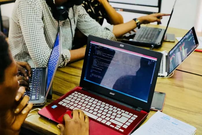 Code on a laptop in a coding class