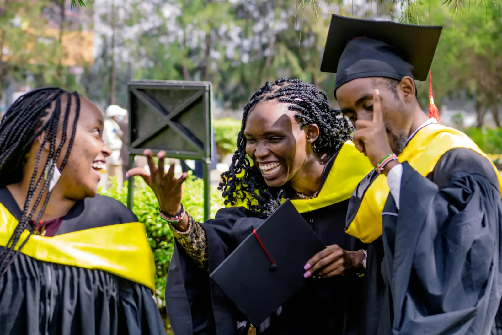Graduates in gowns celebrating together in Nairobi