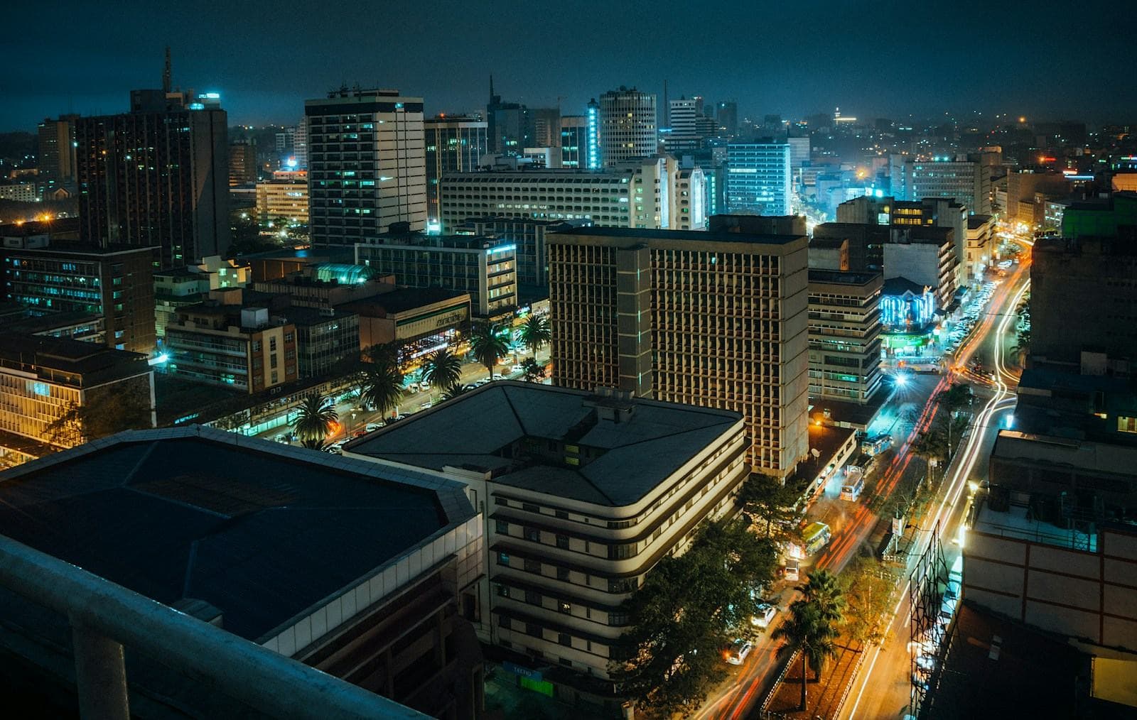 A city centre lit up at night